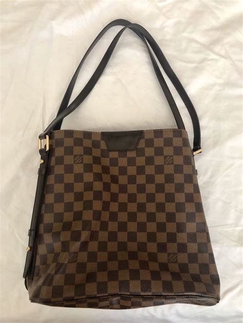 louis vuitton coated fabric cowhide leather trim|louis vuitton bag lining color.